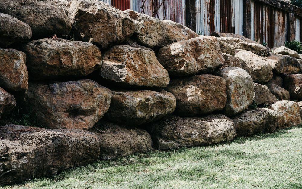 Fence Vs Retaining Walls Which One Do You Need Hammer Excavation