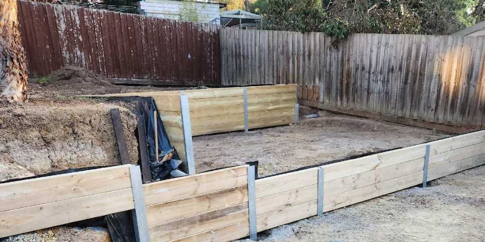 Positioning Retaining Walls Near a Building - Hammer Excavations